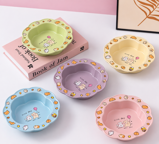 Five colourful scalloped ceramic cat bowls with cute cartoon designs