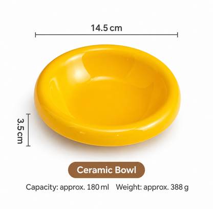 Yellow ceramic pet bowl measuring 14.5 cm with 180 ml capacity