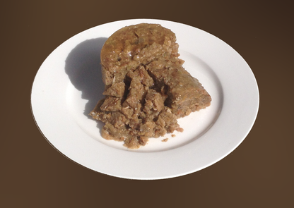 Zealandia Salmon Pate wet cat food texture served on a white plate